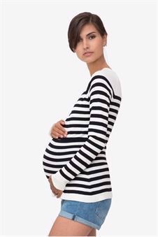 Black/white striped nursing shirt made in organic cotton knit - showcasing its waiting ability 